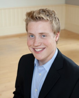 adam wells profile
